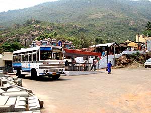 Marudamalai Temple Bus Stand with a view of the temple bus